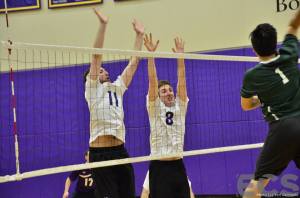 Connor Burton and Devin McIntyre go up for a block on James Ames. courtesy: Emerson Channel Sports